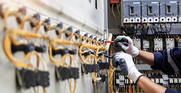 Professional Electrician technician working in Brent, FL